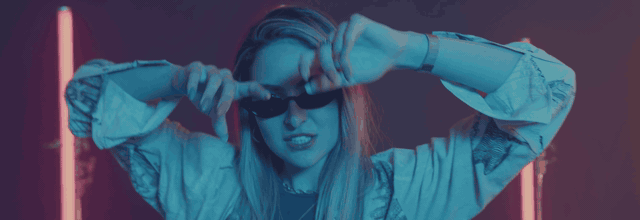 Animated AI Music Video preview showing a vertical electronic MV generated from a source track